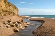 This is the dramatic Jurassic Coast at Burton Bradstock, beyond West Bay at Bridport.