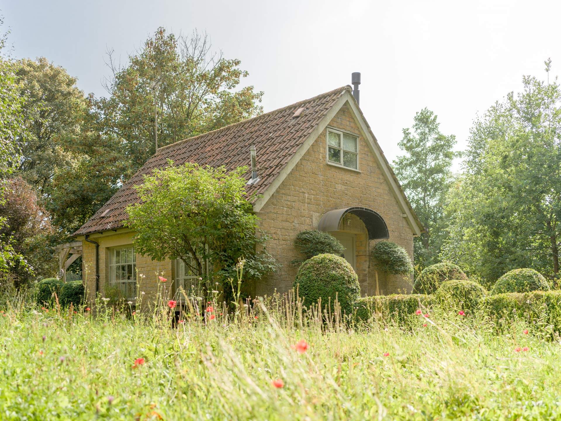 Viewed over the beautiful wild flower meadow.