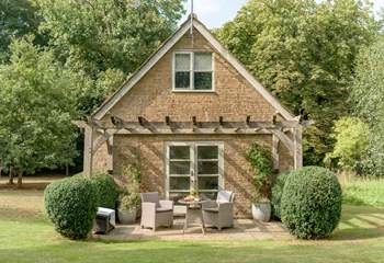 The rear of The Pump House provides a tranquil haven to while away the hours in the stunning gardens.
