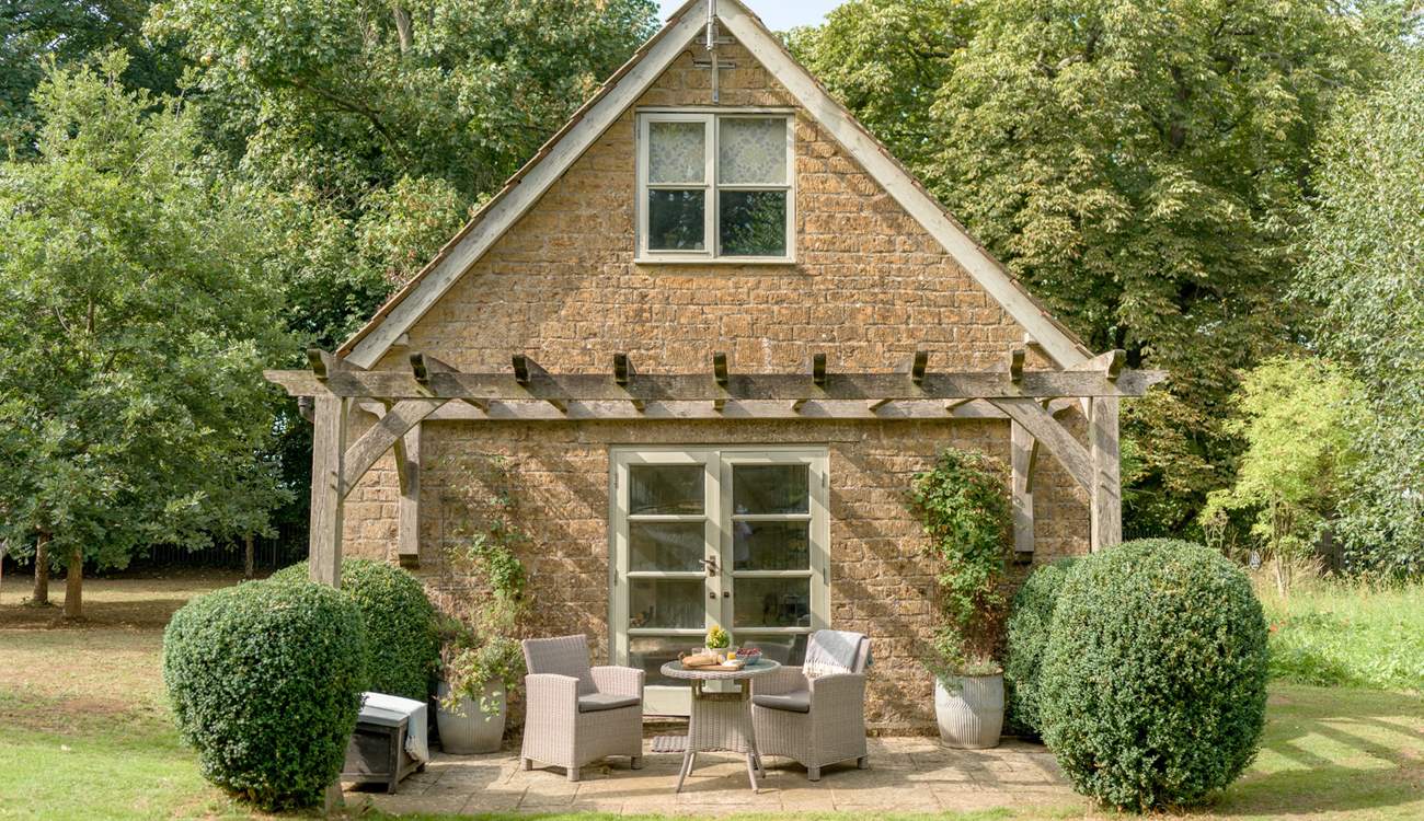 The rear of The Pump House provides a tranquil haven to while away the hours in the stunning gardens.