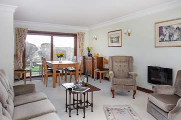 The open plan living space is very sociable with doors opening to the terrace.