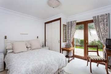 A lovely light bedroom is at the back of the building (Bedroom 1).