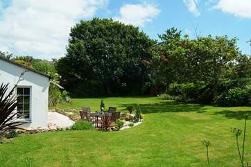 The large garden is beautifully maintained by the owners.
