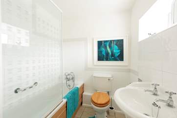 The owners artwork even makes it into the smallest room.
