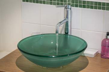 The contemporary sink in the en suite.