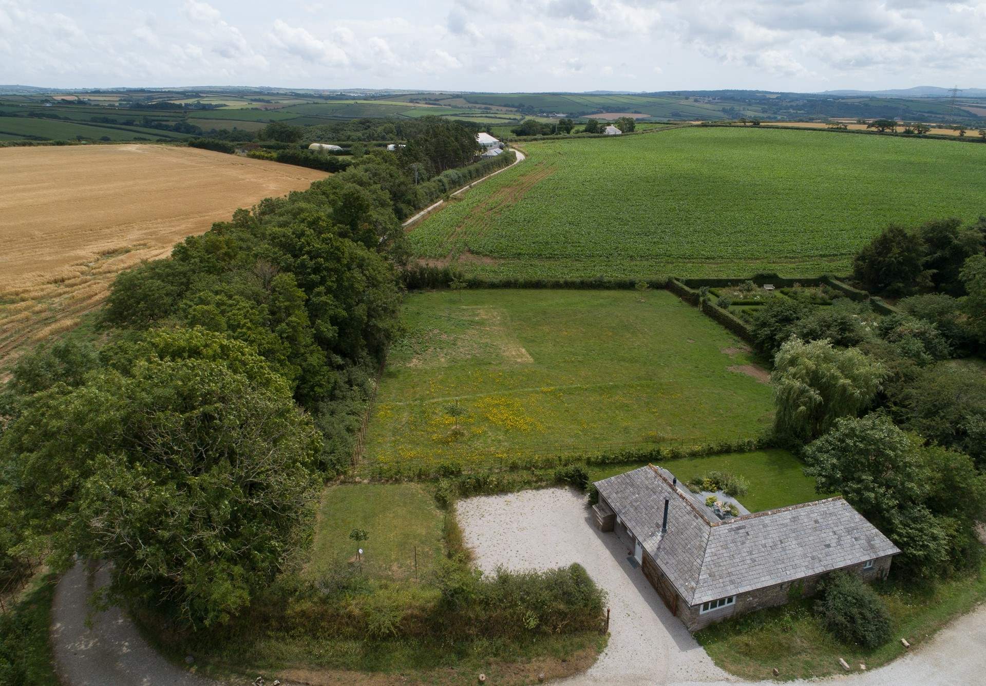 You'll find Little Bokelly surrounded by countryside at the end of a private lane.