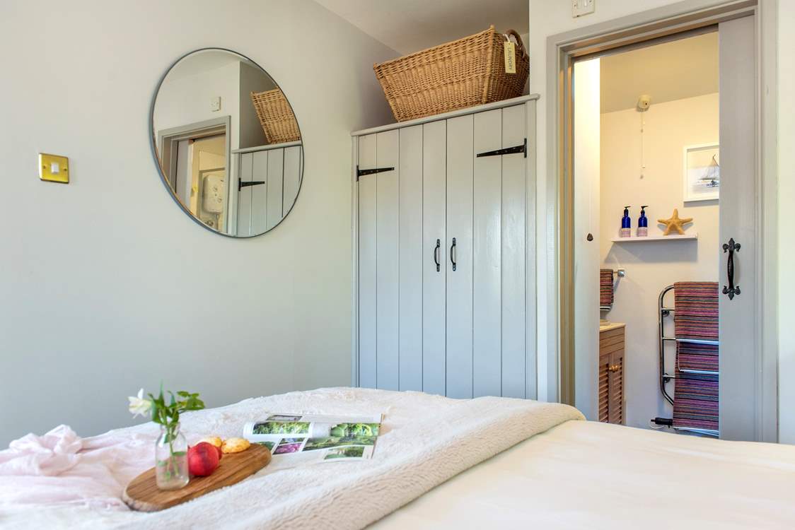 The shower-room leads off from the bedroom.