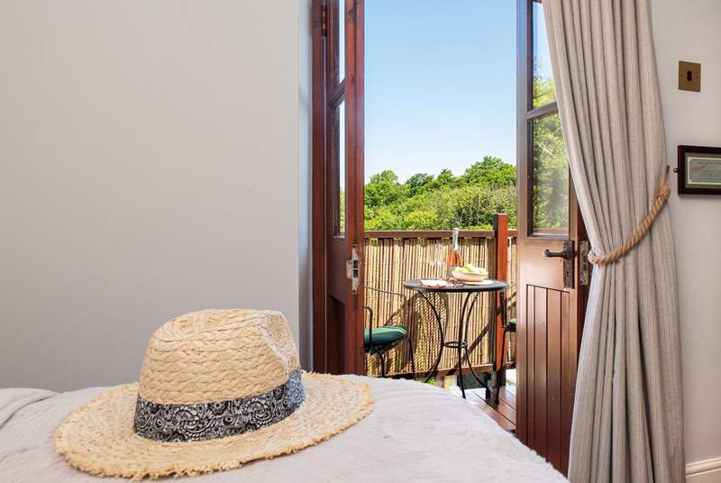 From the bedroom you can step out onto the balcony and enjoy the view.