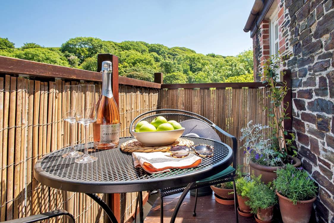 Step out onto the balcony and enjoy the sun.