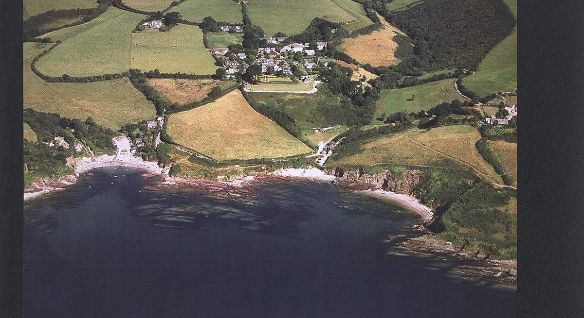 An aerial photograph of Talland Bay, with the beach on the left a few minutes' walk down the hill from Fred's House.