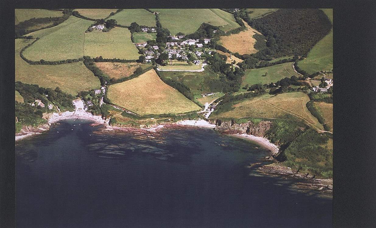 An aerial photograph of Talland Bay, with the beach on the left a few minutes' walk down the hill from Fred's House.