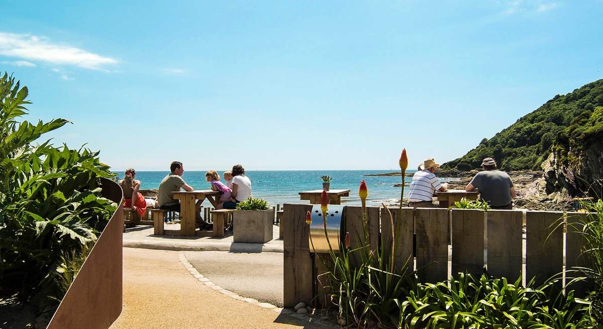 A short stroll down the road to the beach and beach café-  a great place for a bite to eat! (Not the view from the property)