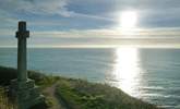 The Celtic cross on the clifftop at sunset. - Thumbnail Image