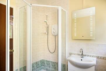 The family bathroom is on the ground floor and has a separate shower cubicle.