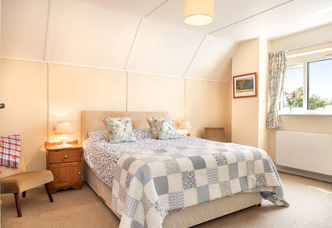 Bedroom Two is lovely and spacious and enjoys views of the countryside and coastline.
