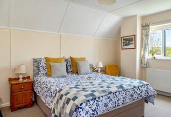 A wonderful king-size bed awaits in the second bedroom.