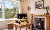 The toasty wood-burner makes this a great retreat all year round. - Thumbnail Image