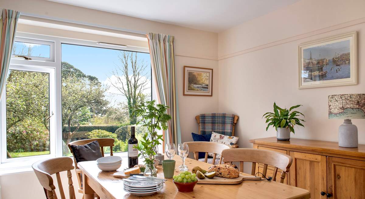 The dining-room looks out onto the gorgeous garden.