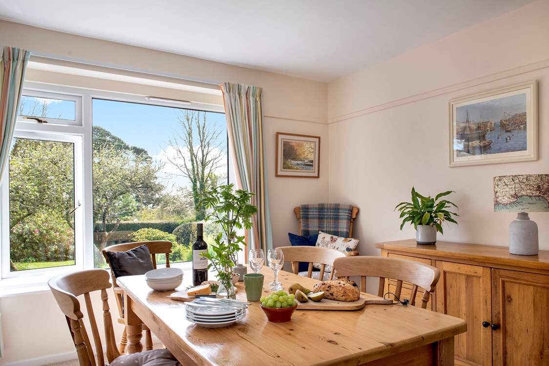 The dining-room looks out onto the gorgeous garden.