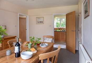 The kitchen leads off from the dining room.