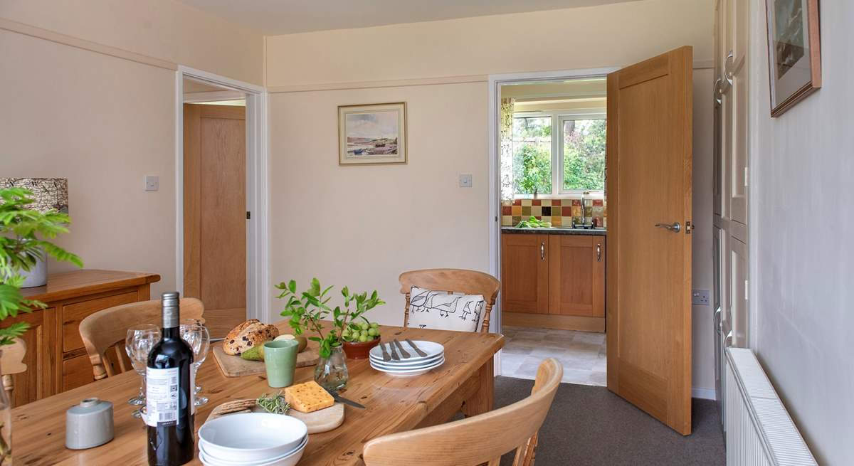 The kitchen leads off from the dining room.