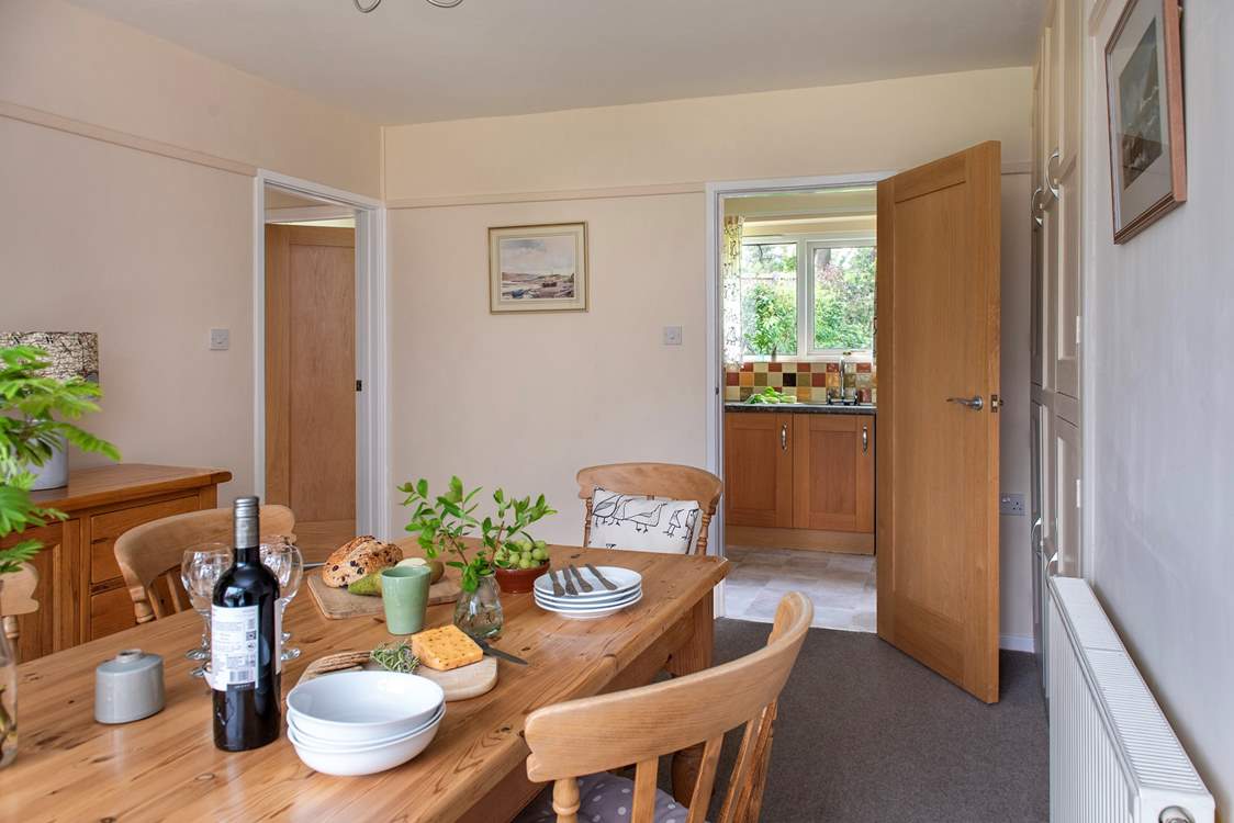 The kitchen leads off from the dining room.