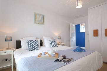 Bedroom 1 has 'zip and link' beds (3' twin beds or a 6' super-king size double bed) and patio doors onto the deck.