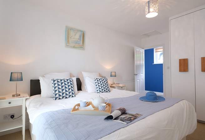 Bedroom 1 has 'zip and link' beds (3' twin beds or a 6' super-king size double bed) and patio doors onto the deck.