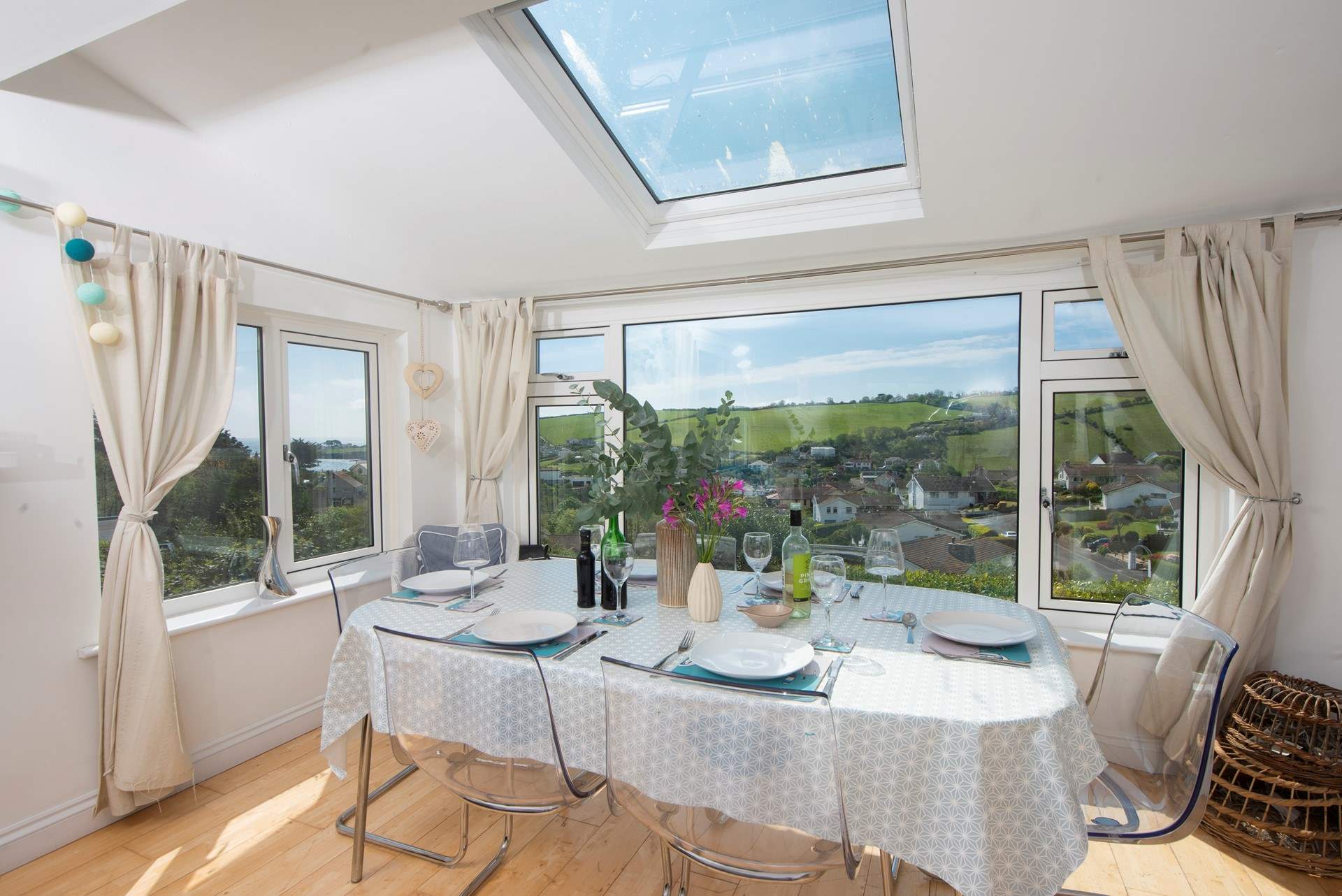 The big glass windows in the dining-area allow you to soak in the views whilst enjoying a delicious meal.