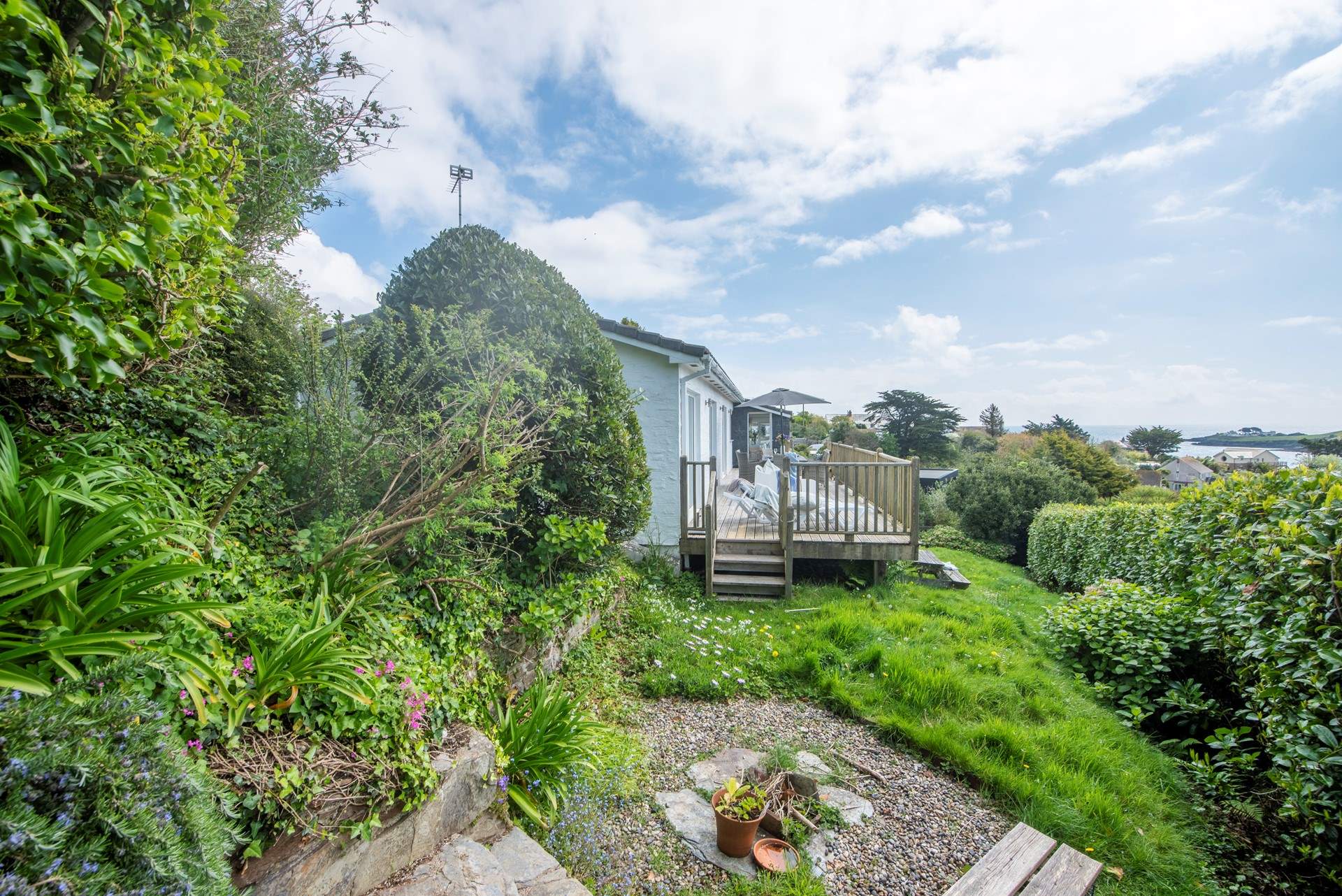 Access to the garden from the wooden deck.