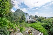 Access to the garden from the wooden deck.