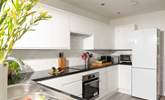 The kitchen is beautifully bright and airy. - Thumbnail Image