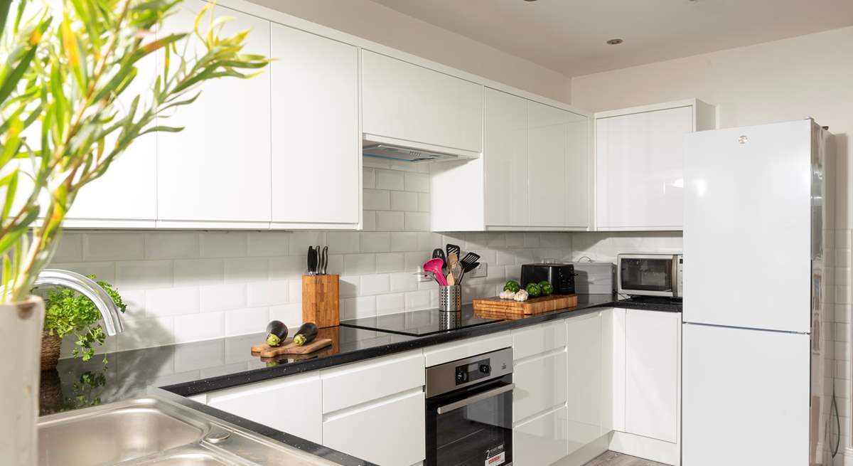 The kitchen is beautifully bright and airy.