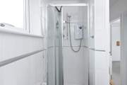 There is a separate shower cubicle in the family bathroom.