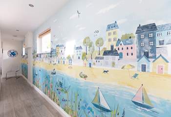 Quirky seaside themed artwork adorns the walls. 