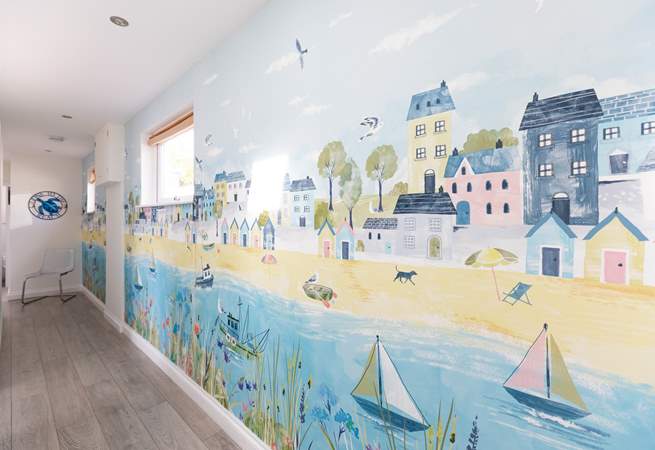Quirky seaside themed artwork adorns the walls. 