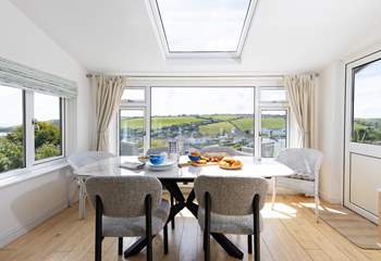 Gather around the dining table and chat about the day ahead. 