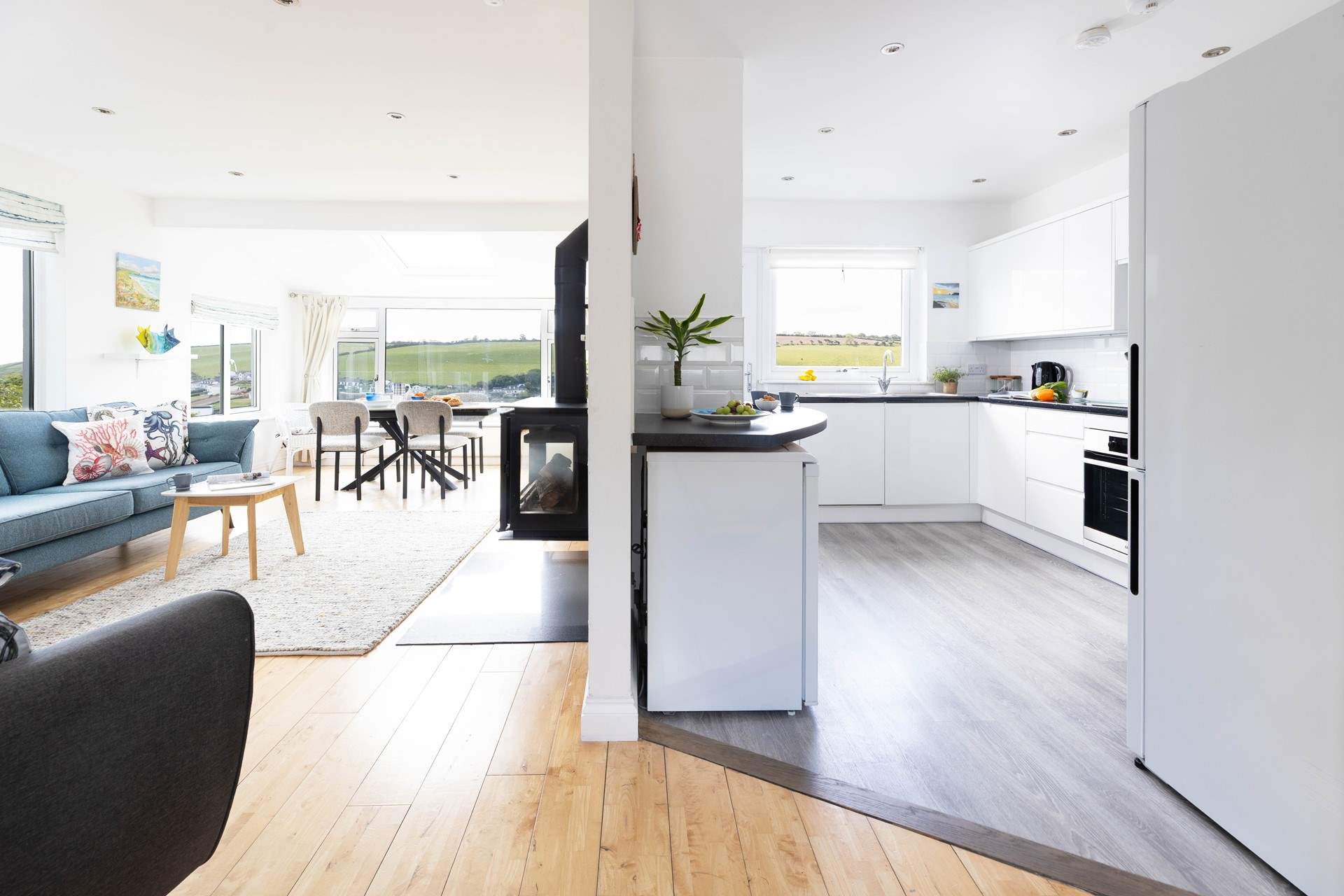 The open-plan living space is beautifully furnished.