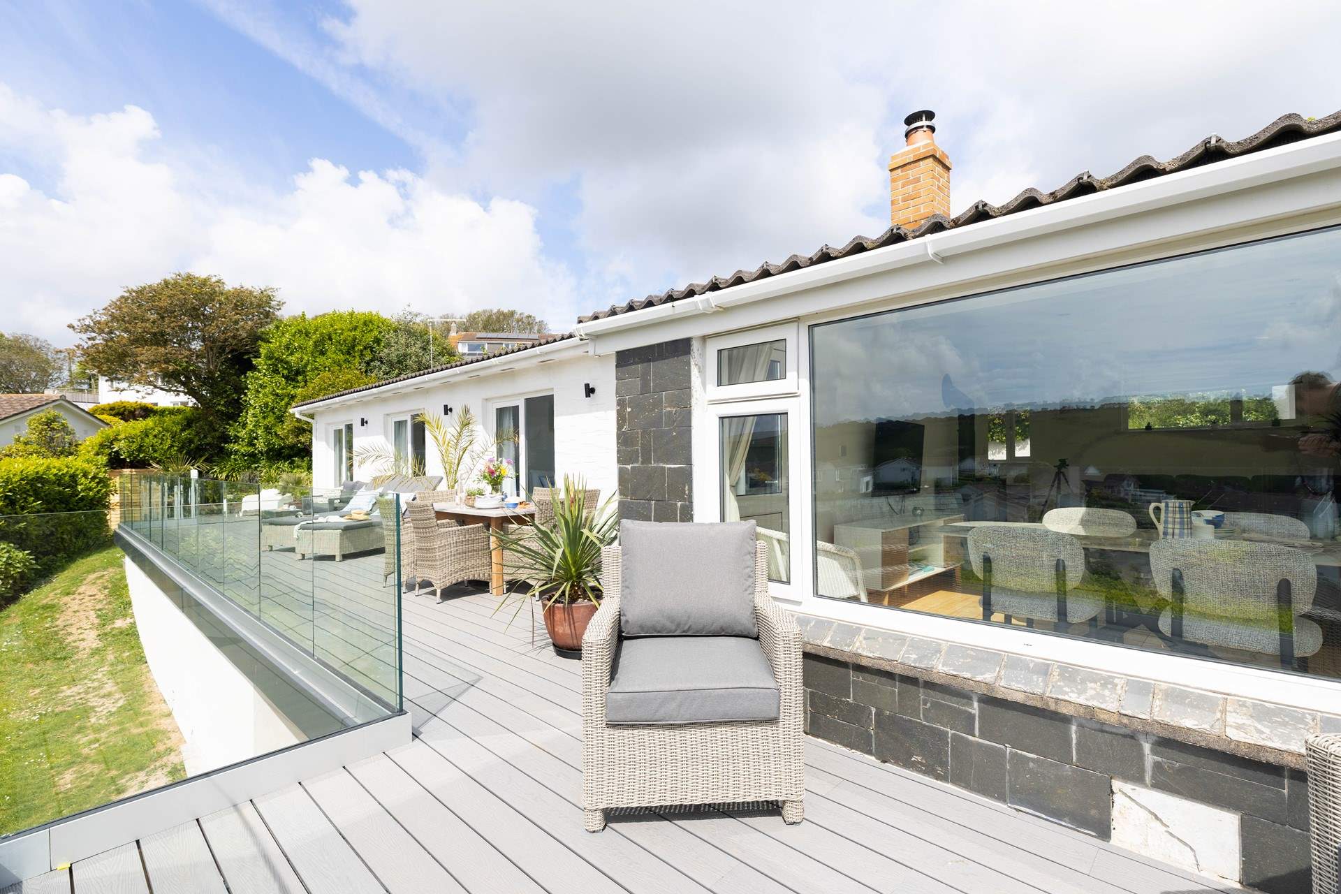 The sunny deck is a wonderful addition and perfect for alfresco dining. 