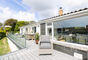 The sunny deck is a wonderful addition and perfect for alfresco dining. 