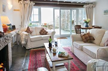 The large patio doors lead out to the terrace.