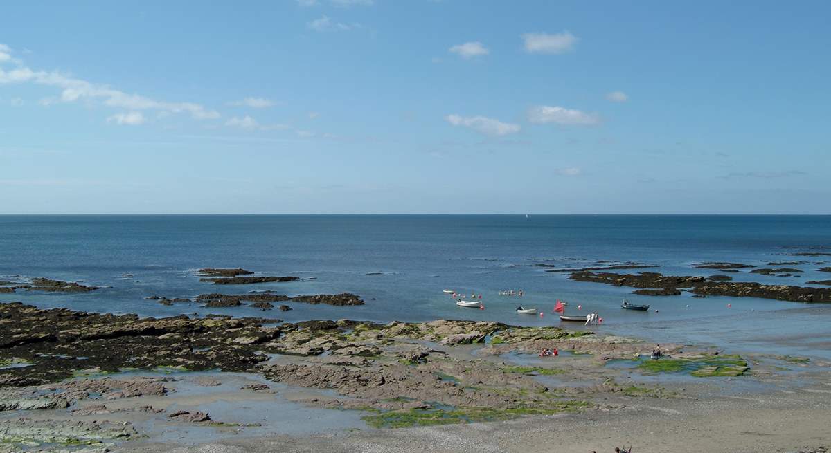 Private steps lead down to the foreshore from the garden.