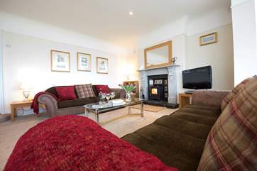 The cosy end of the sitting-room.