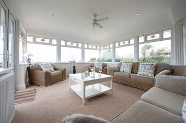 The conservatory end of the sitting-room.
