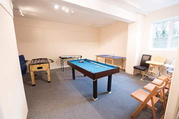 The games-room has a half-size pool table.