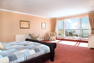 The large windows let the light flood in and takes full advantage of the view.