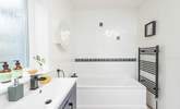 The en suite has the luxury of a bath and separate shower cubicle. - Thumbnail Image