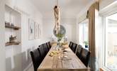 Gather all to enjoy holiday mealtimes around the fabulous dining table. - Thumbnail Image