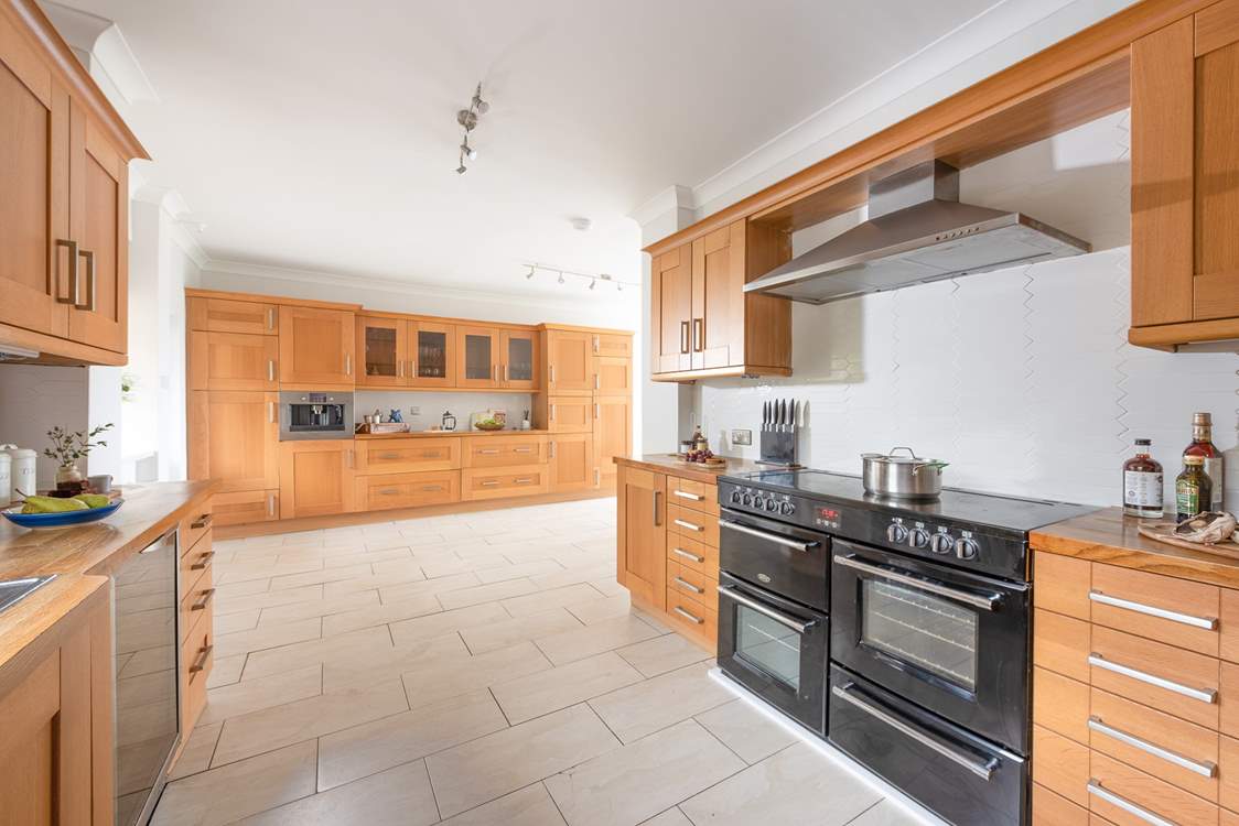 The kitchen is incredibly well-equipped, with plenty of storage.