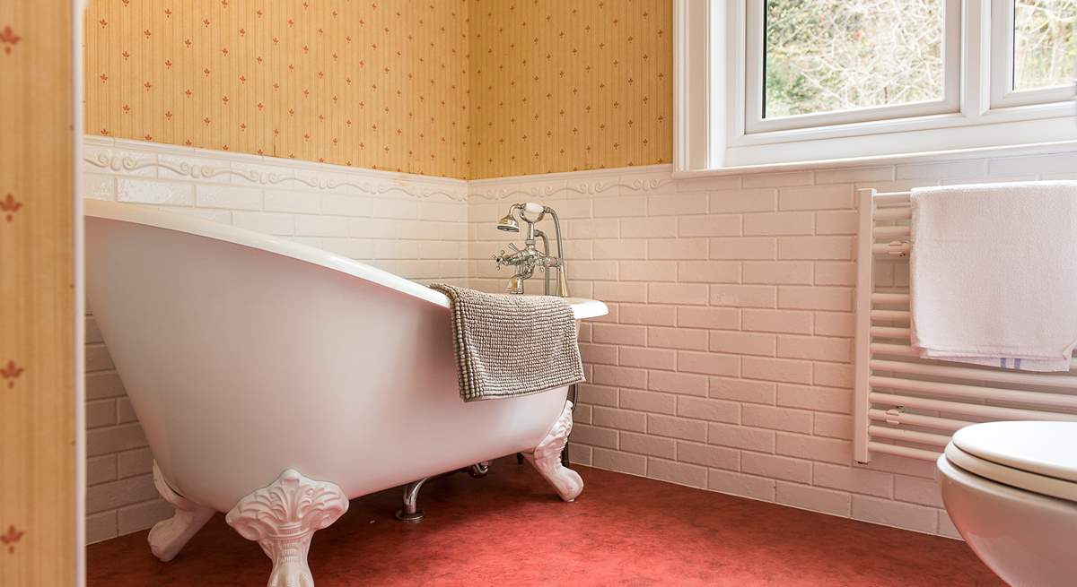 The second bathroom on the first floor, with a gorgeous free-standing bath.